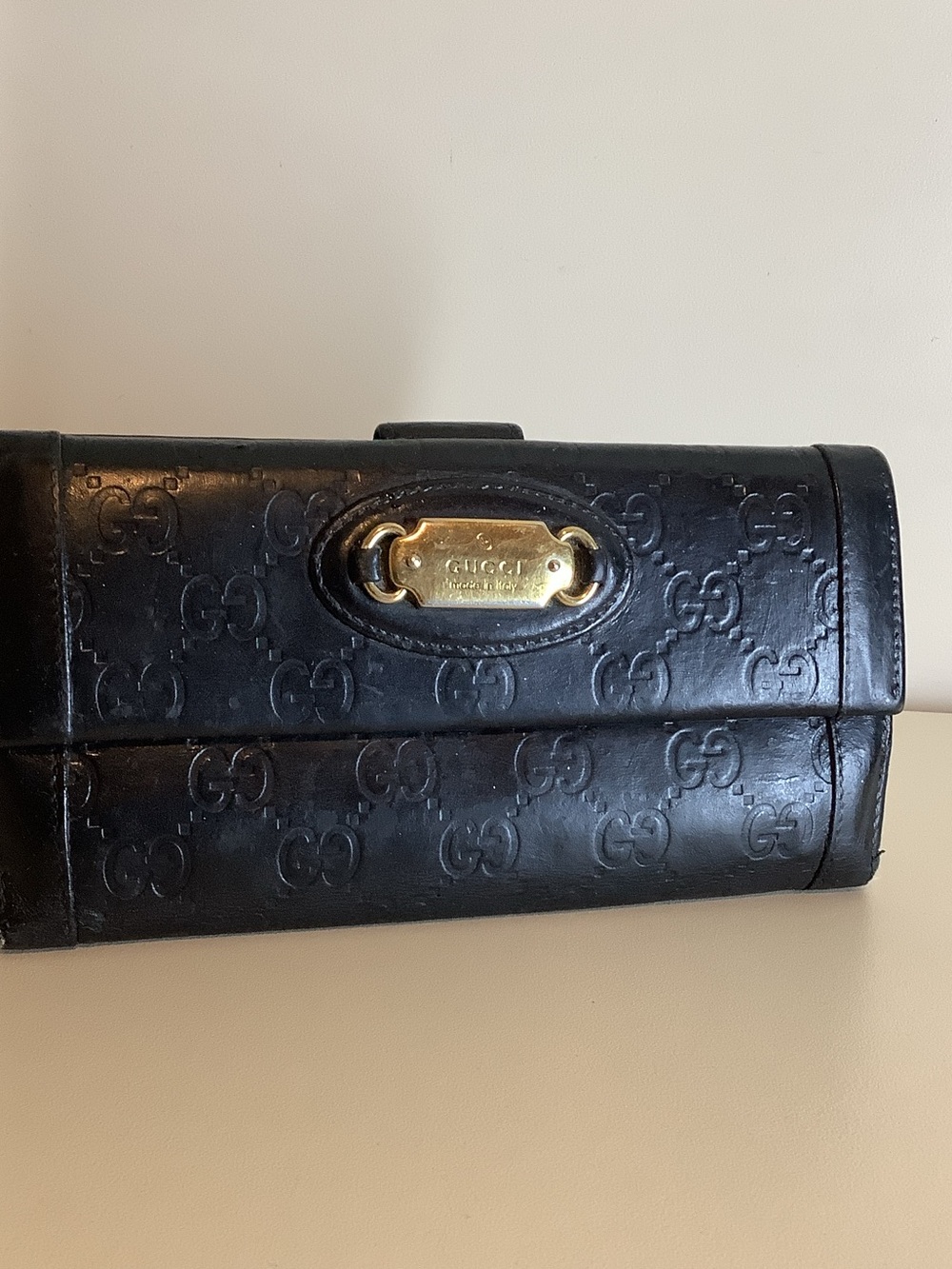 Gucci Black Embossed GG Leather wallet with Gold Plaque Accent